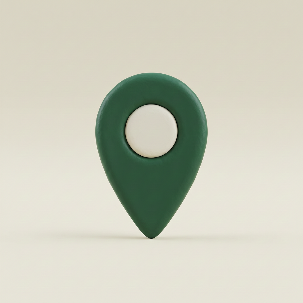Green location pin icon with white center circle on neutral background