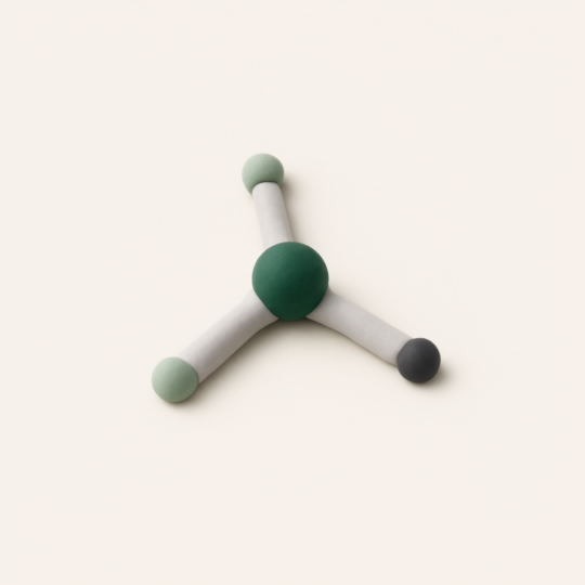 A molecular structure model with interconnected green, light green, and dark spheres representing atoms or molecules connected by silver rods