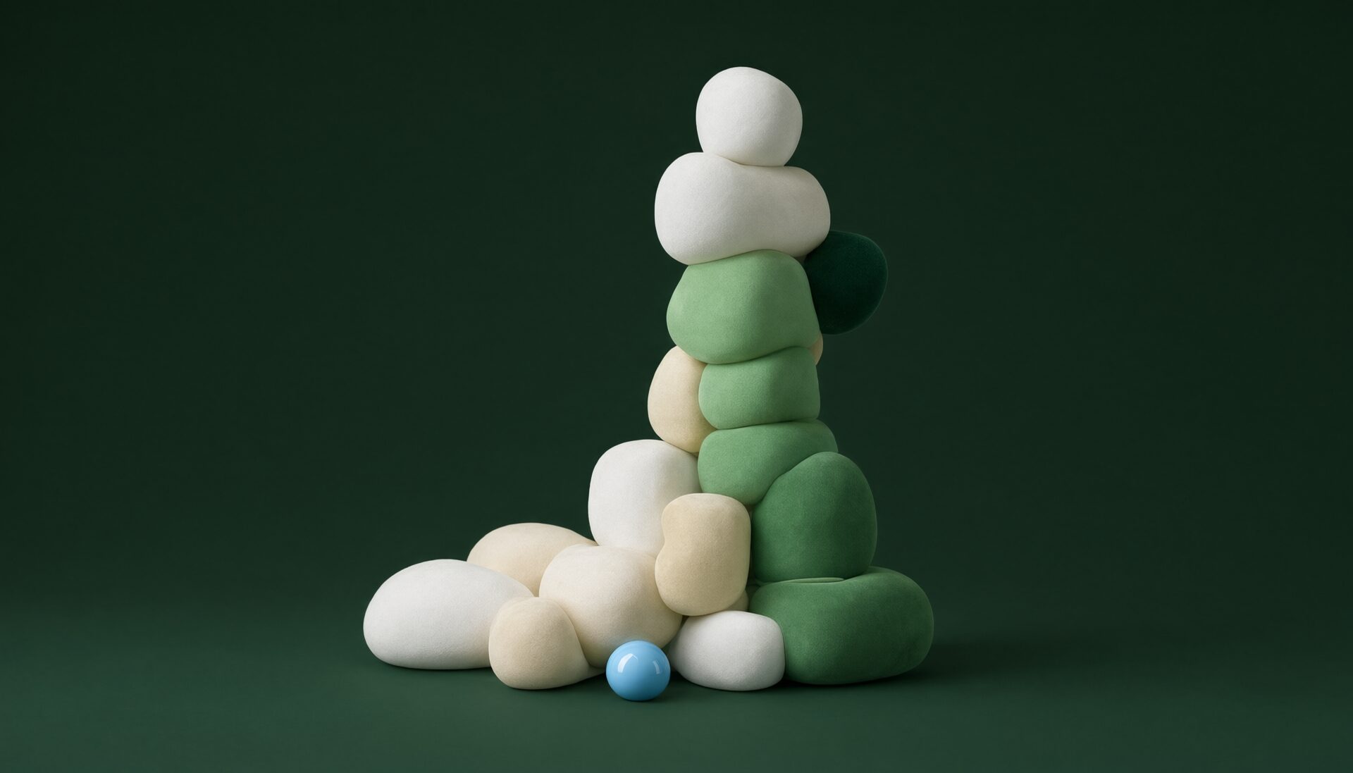 Stacked colorful spheres and rounded forms in white, cream, green, and blue arranged on a dark green background